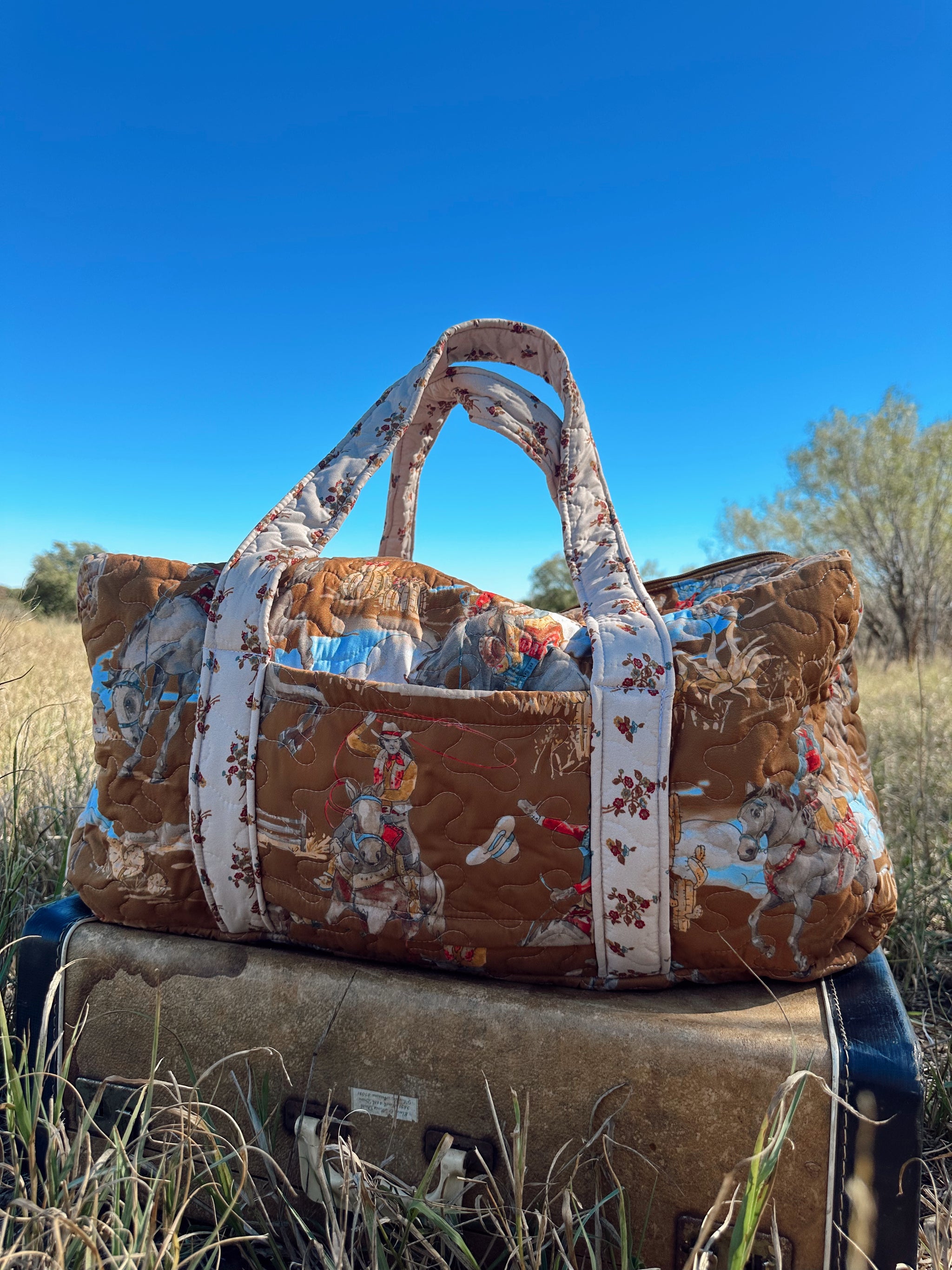 Birdie Gold Quilted Duffle Bag