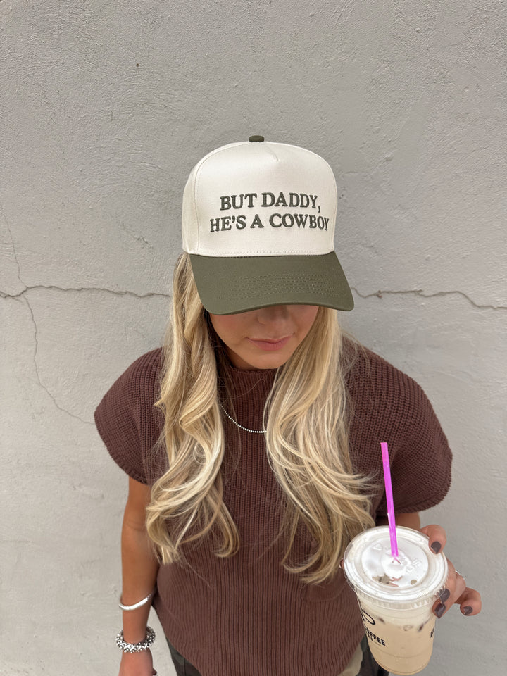 BUT DADDY, HE'S A COWBOY CAP