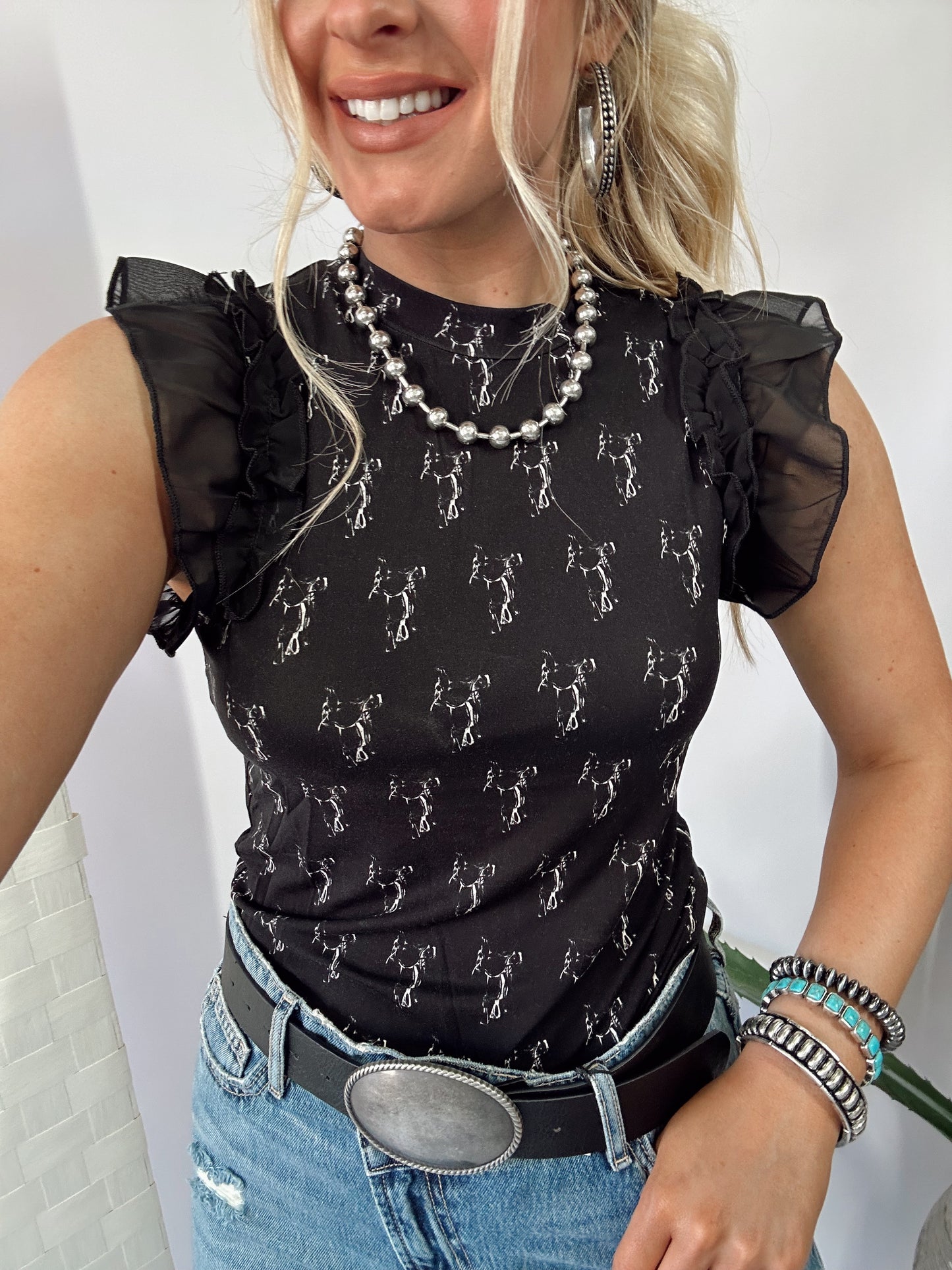 THE SADDLERY TOP
