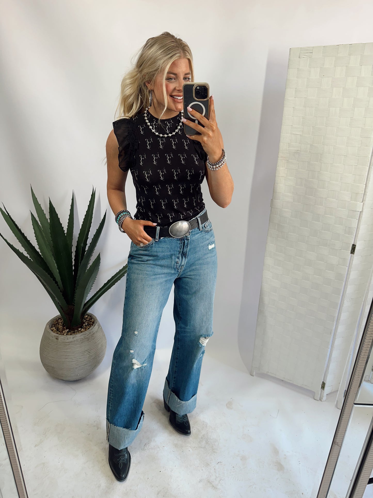 THE SADDLERY TOP