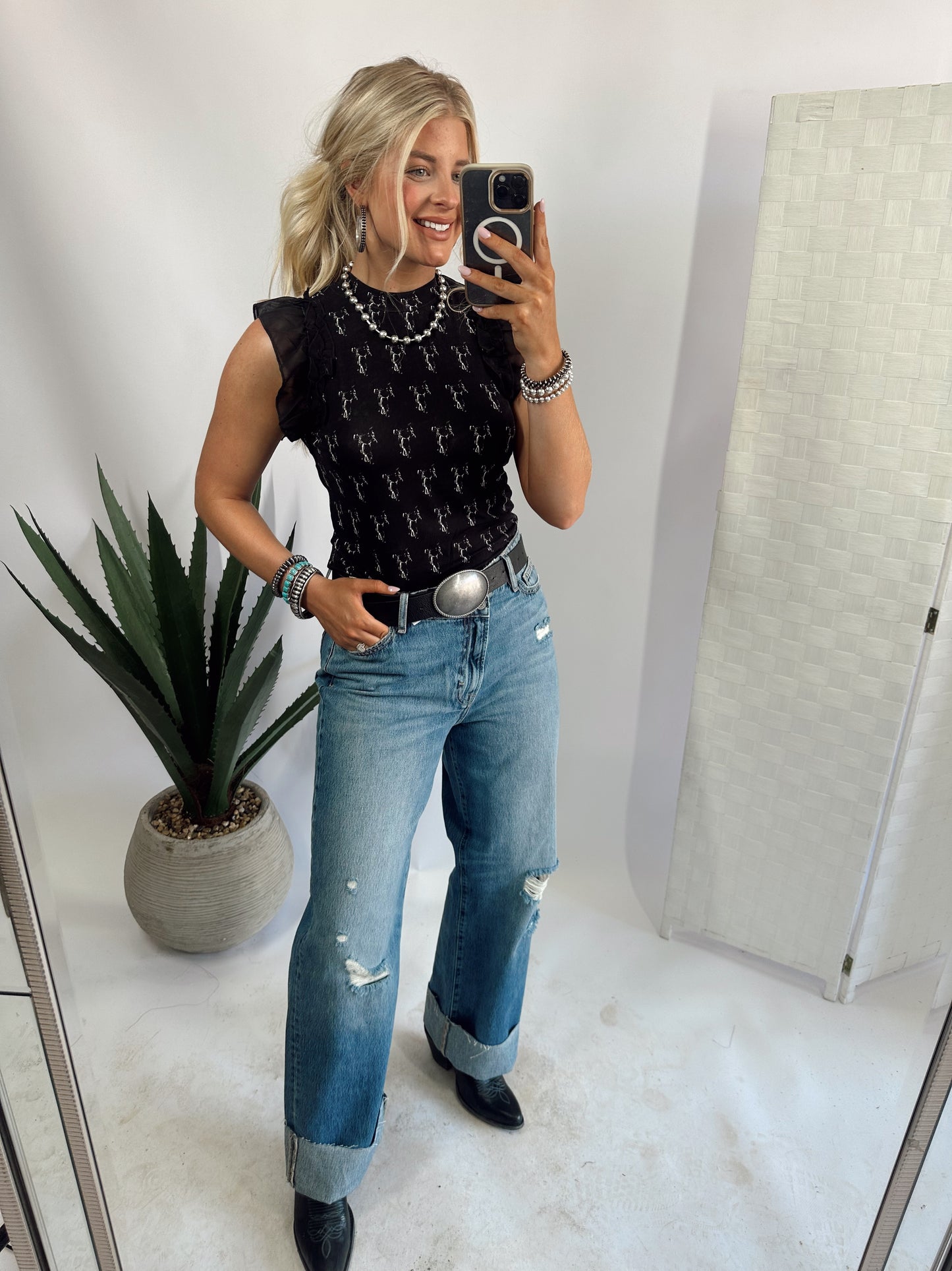THE SADDLERY TOP
